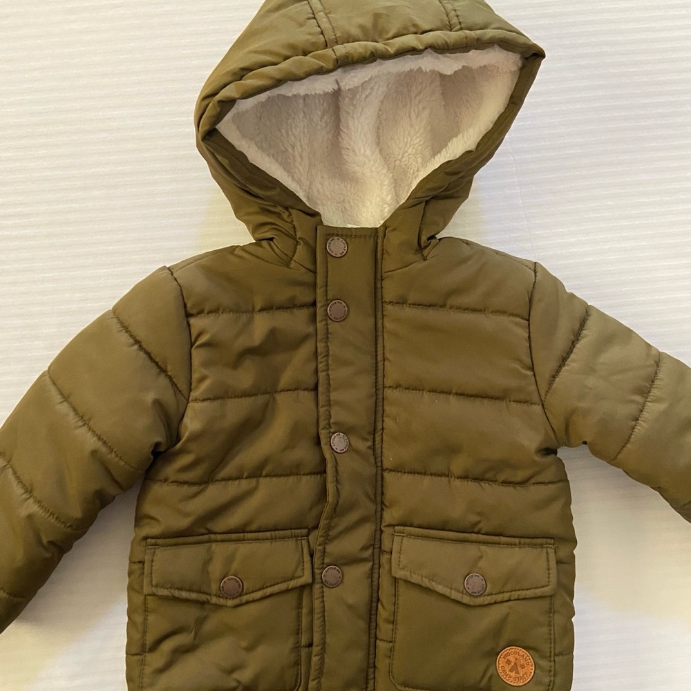 NWOT-Brand New toddler boy olive green hooded puffer jacket. Size 18mo’s.
